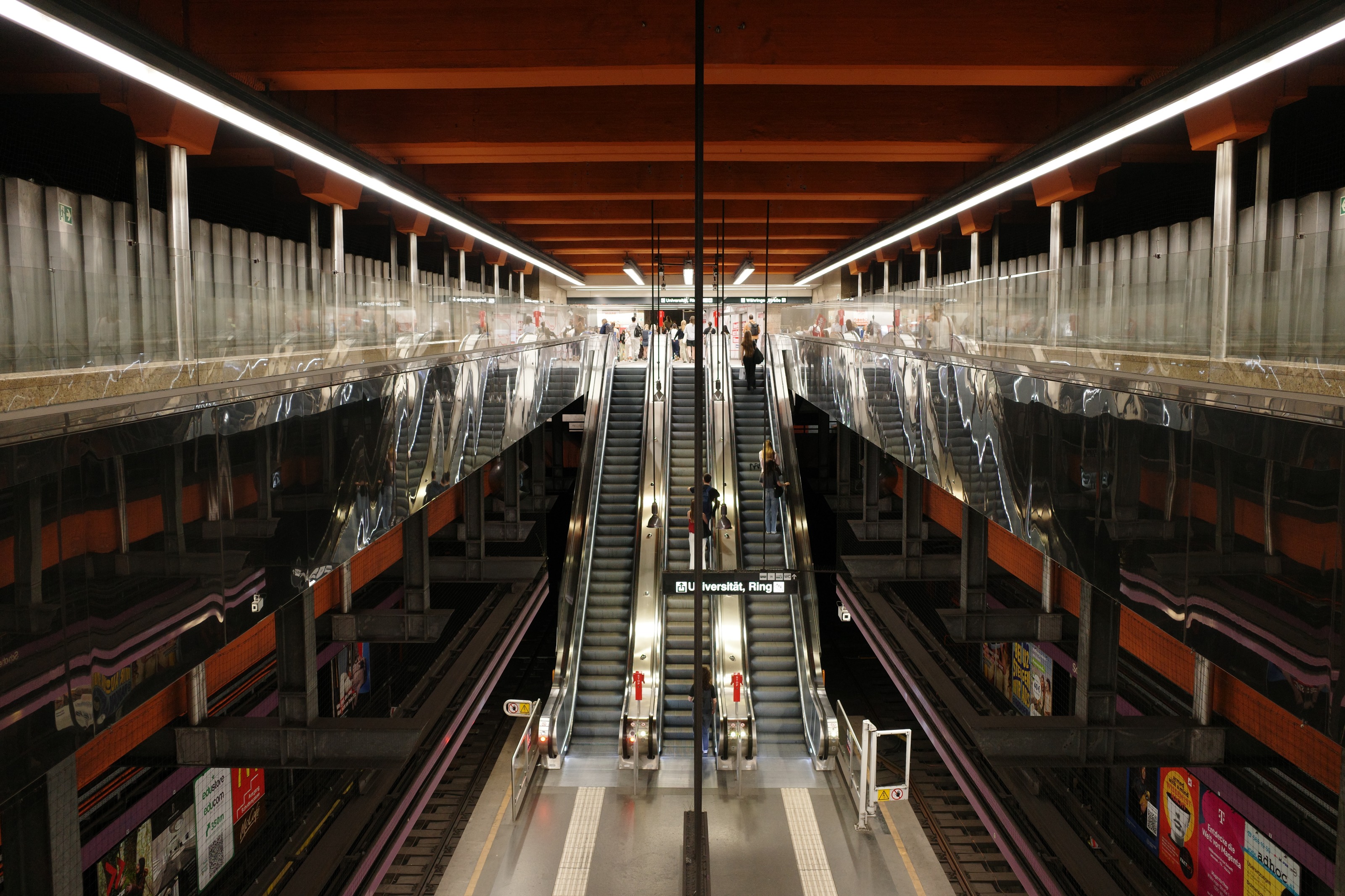Escalators in an underground station, symmetrical view